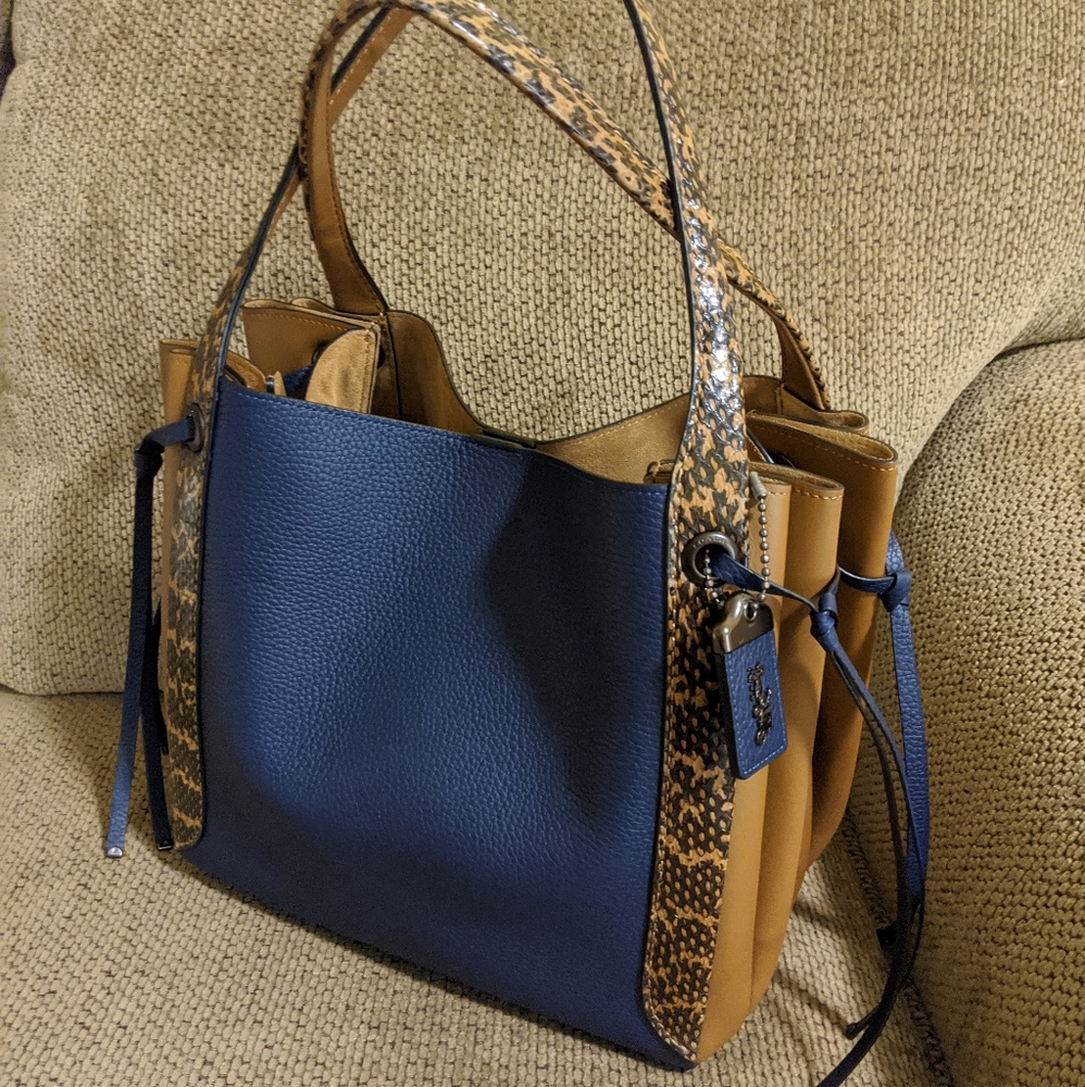 **SOLD**Coach Harmony